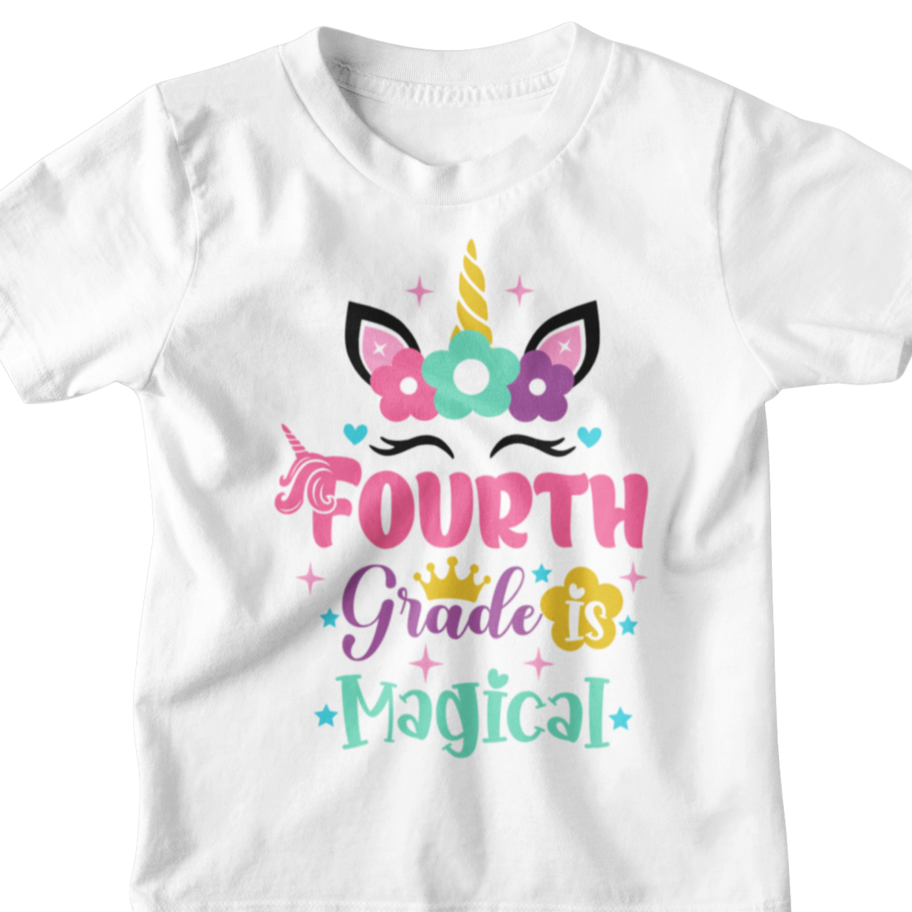 White t-shirt with unicorn design and 'Fourth Grade is Magical' text on a white background