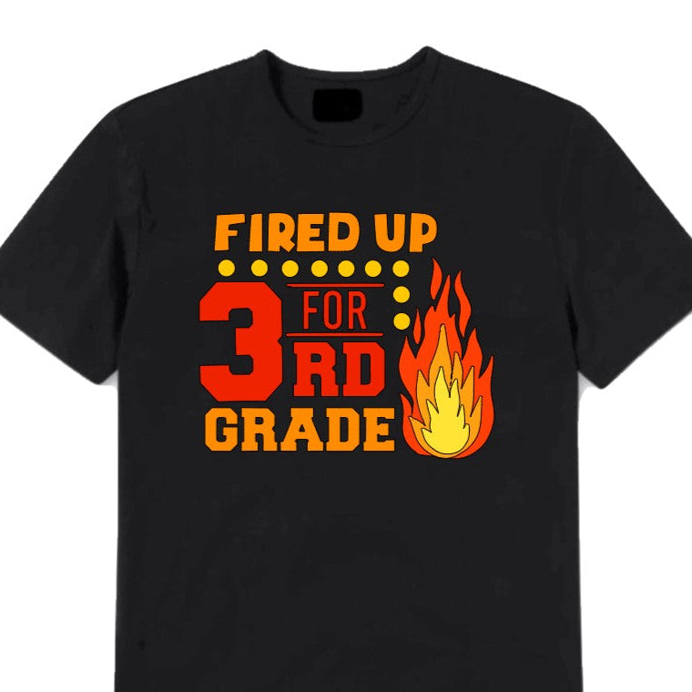 Black t-shirt with 'Fired Up for 3rd Grade' text and flame graphic on a white background