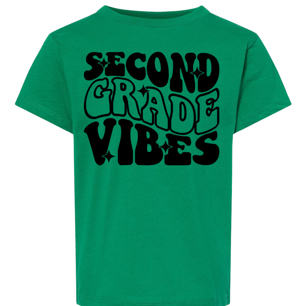 Green t-shirt with 'SECOND GRADE VIBES' text on a white background